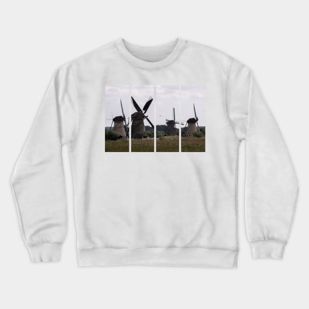 Wonderful landscapes in the Netherlands. Historic dutch windmills in Kinderdijk in a cloudy autumn day. Unesco site. Natural view from distance. Crewneck Sweatshirt by fabbroni-art